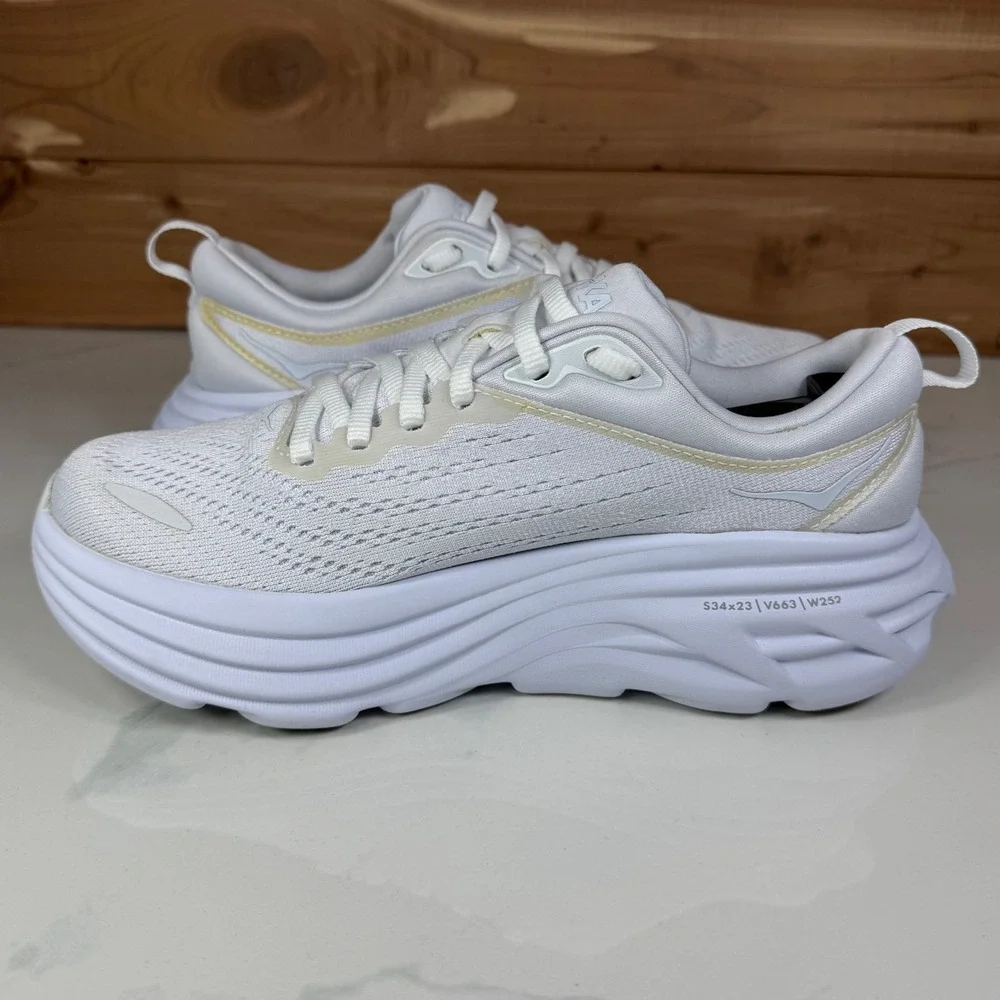 Hoka One One White Athletic Running Shoes with Subtle Gold Trim
